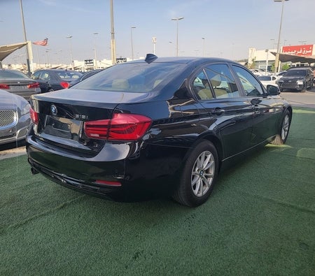 Blue BMW 318i 2016