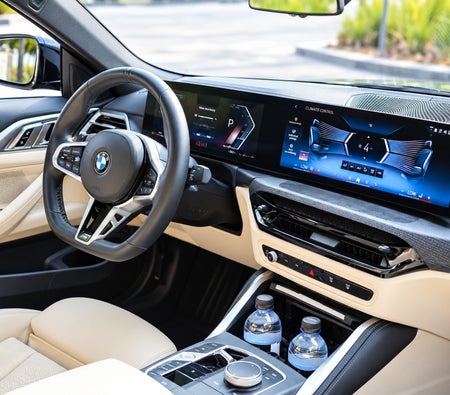 Blue BMW 4 Series Convertible 2025