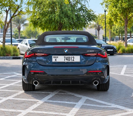 Blue BMW 4 Series Convertible 2025