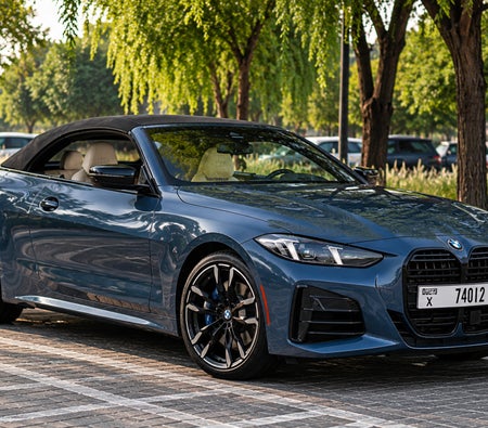 Blue BMW 4 Series Convertible 2025