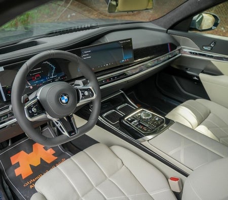Blue BMW 735i 2025