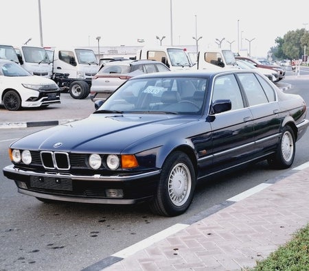 Blue BMW 735i 1990