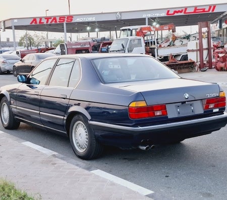 Blue BMW 735i 1990