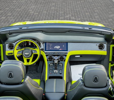 Yellow Bentley Continental GTC 2026