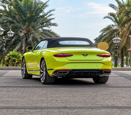 Yellow Bentley Continental GTC 2026