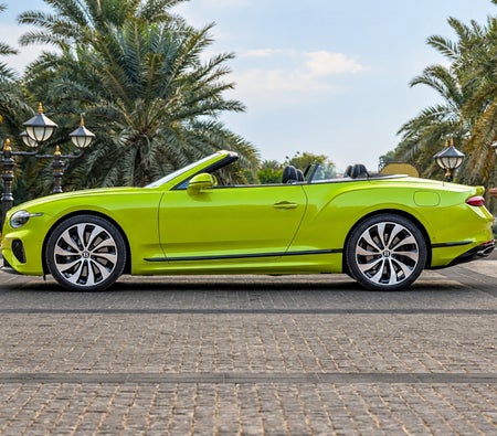 Yellow Bentley Continental GTC 2026