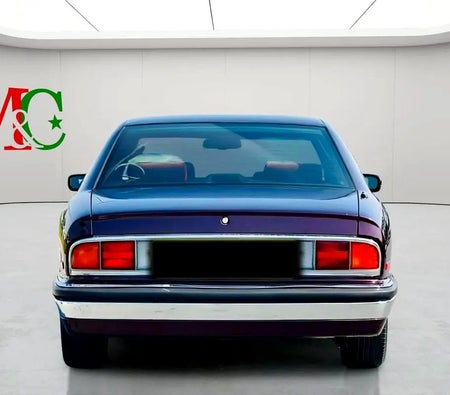 Red Buick Riviera 1993