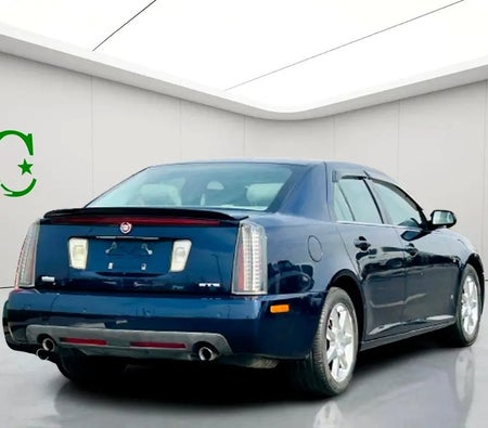 Blue Cadillac STS Seville 2006