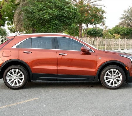Orange Cadillac XT4 Premium Luxury 2019