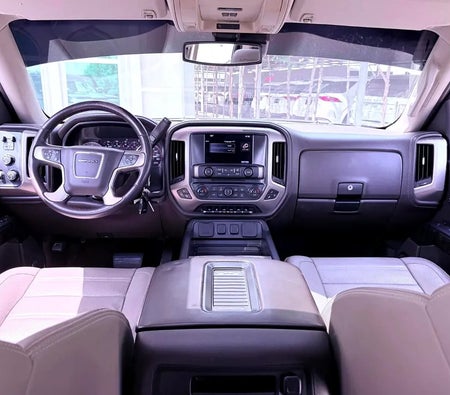 Черный GMC Sierra Denali 2016 год