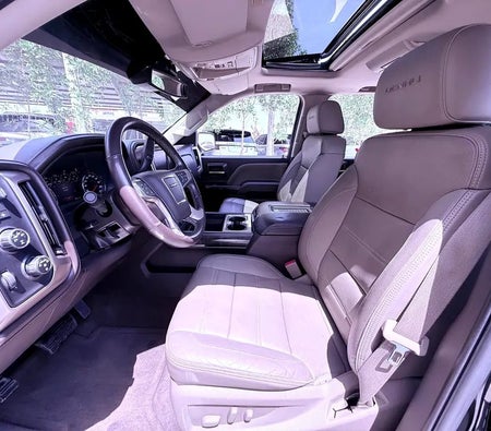 Черный GMC Sierra Denali 2016 год