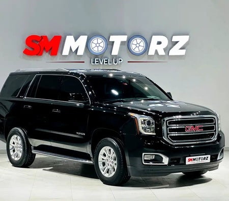Черный GMC Yukon SLE 2017 год