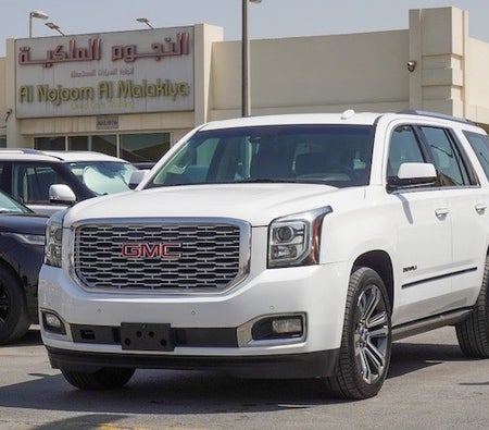 White GMC Yukon Denali 2018