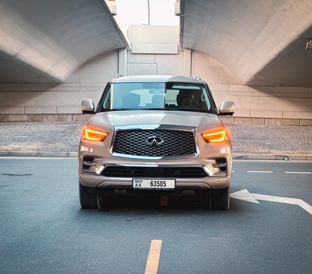 Golden Infiniti QX80 2024
