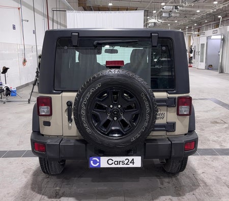 Beige Jeep Wrangler Sport 2018