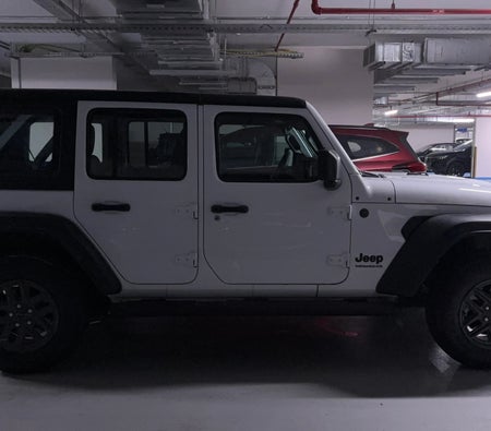 White Jeep Wrangler Unlimited Sport 2024