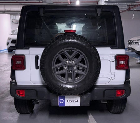 White Jeep Wrangler Unlimited Sport 2024