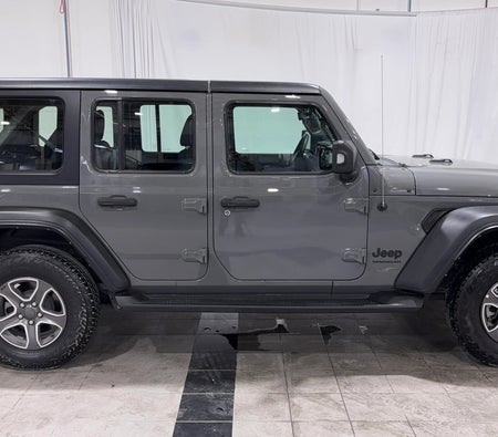 Gray Jeep Wrangler Unlimited Sport 2023
