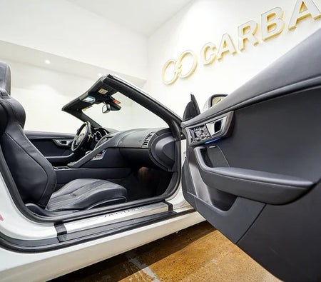 Белый Jaguar F Type S 2015 год