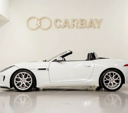 Белый Jaguar F Type S 2015 год