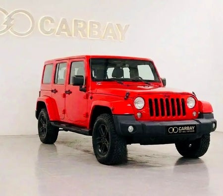 Красный Jeep Wrangler 2017 год