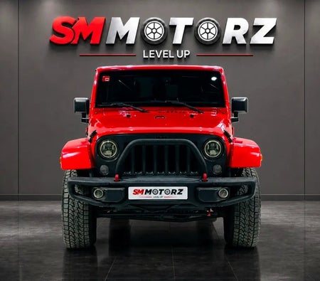Красный Jeep Wrangler 2018 год