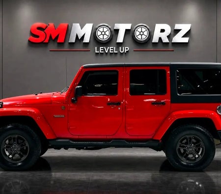 Красный Jeep Wrangler 2018 год