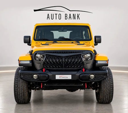 Желтый Jeep Wrangler Rubicon 2020 год