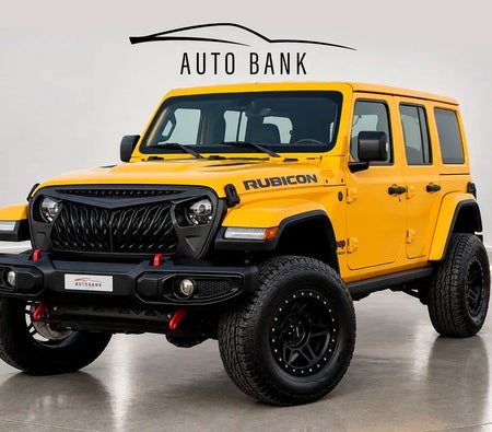 Желтый Jeep Wrangler Rubicon 2020 год