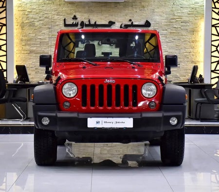 Красный Jeep Wrangler Sport 2017 год Красный Jeep Wrangler Sport 2017 год