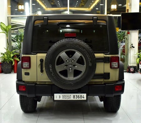 Beige Jeep Wrangler Sport 2017