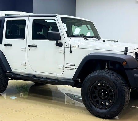 White Jeep Wrangler Unlimited Sport 2018