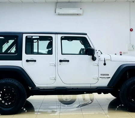 White Jeep Wrangler Unlimited Sport 2018