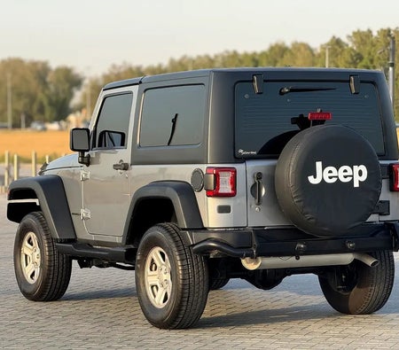 Gray Jeep Wrangler Unlimited Sport 2013