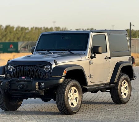 Gray Jeep Wrangler Unlimited Sport 2013