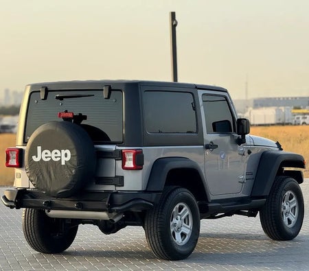 Gray Jeep Wrangler Unlimited Sport 2013