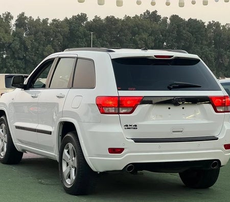 Blanc Jeep Cherokee Limited 2013