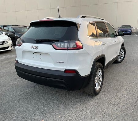 White Jeep Cherokee Limited MID 2019