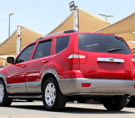 Красный Kia Mohave 2013