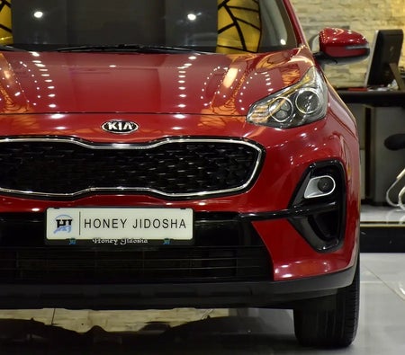 Red Kia Sportage EX 2021