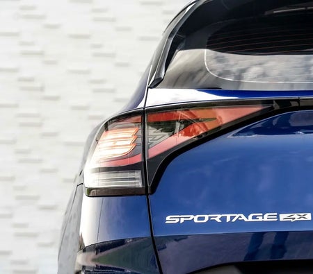 Blue Kia Sportage EX 2025