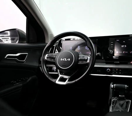Green Kia Sportage 2024