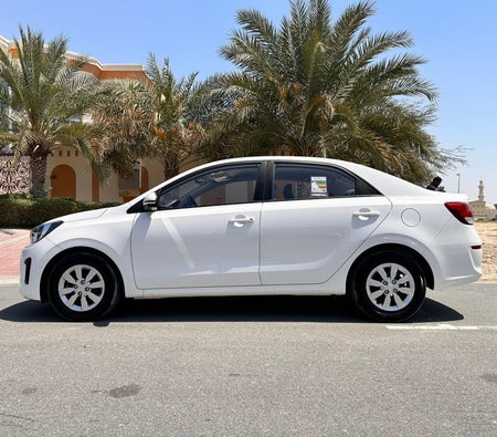 White Kia Pegas 2024