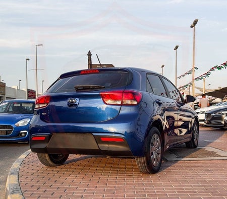 Blue Kia Rio 2020