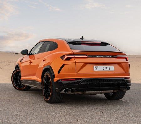Orange Lamborghini Urus S 2024