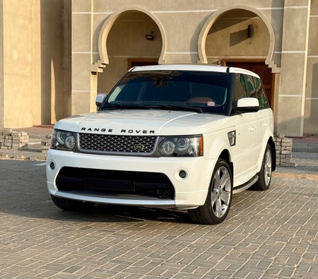 Белый Land Rover Range Rover Sport HSE 2012 год