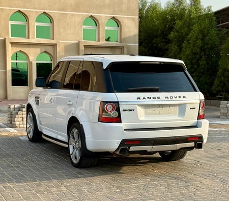 Белый Land Rover Range Rover Sport HSE 2012 год