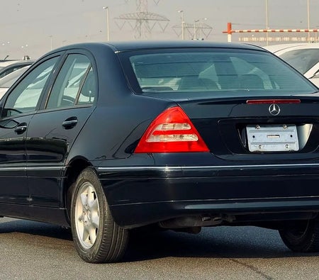 Blue Mercedes Benz C240 2002