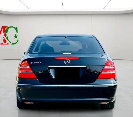 Black Mercedes Benz E320 2004