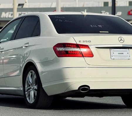 White Mercedes Benz E350 2011